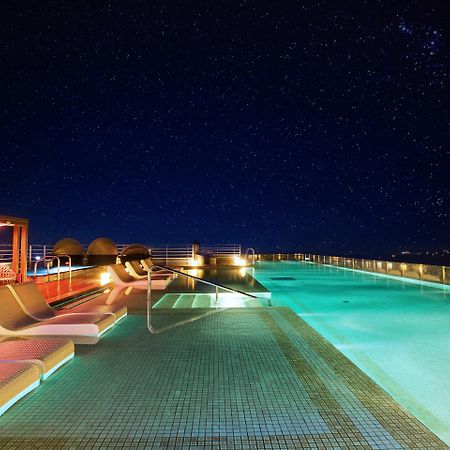 Kensington Jeju Hotel Ngoại thất bức ảnh Rooftop pool at the hotel